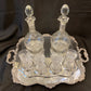 Antique silver plated drinks tray with cut crystal bottles and glasses