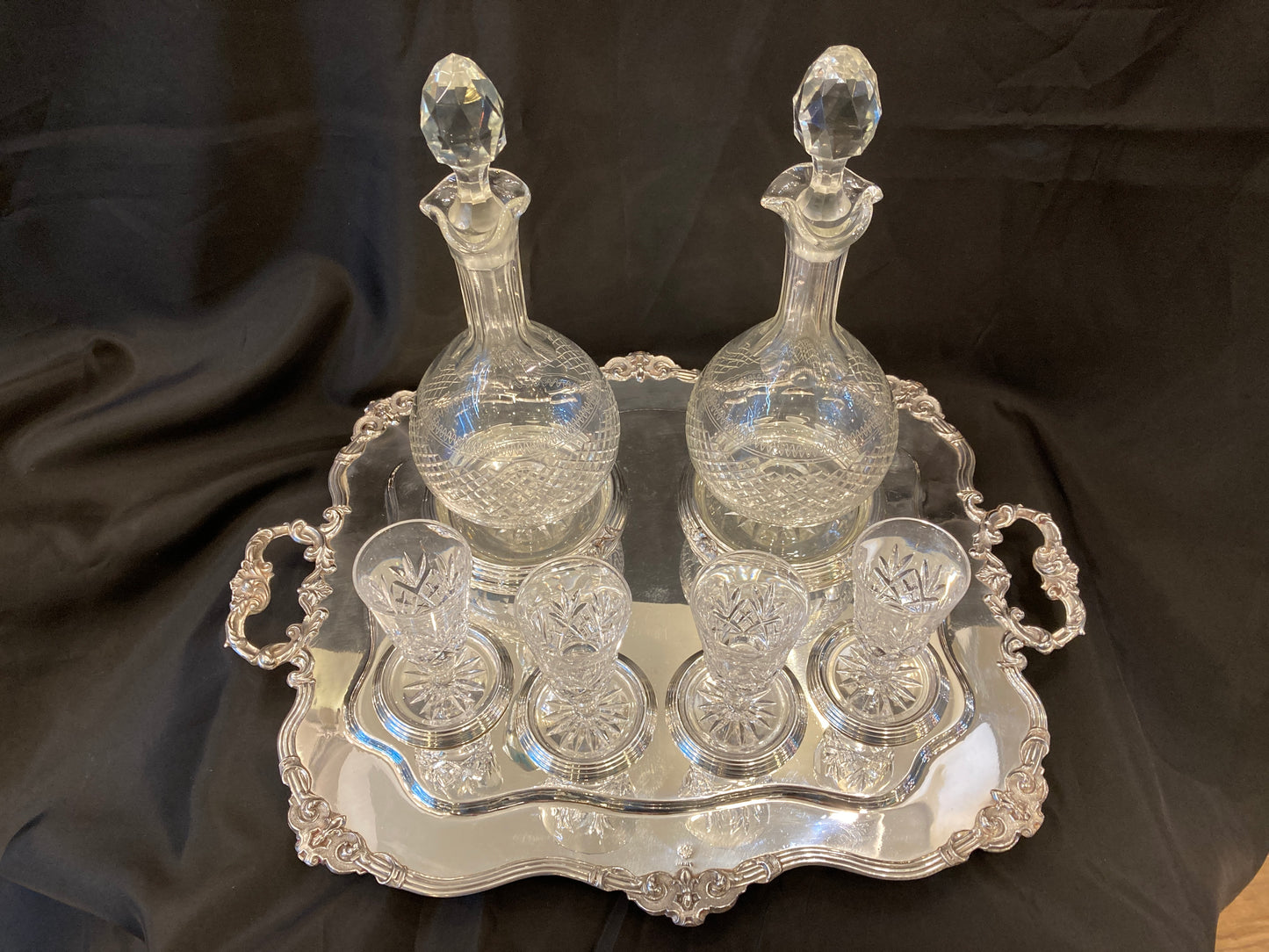 Antique silver plated drinks tray with cut crystal bottles and glasses