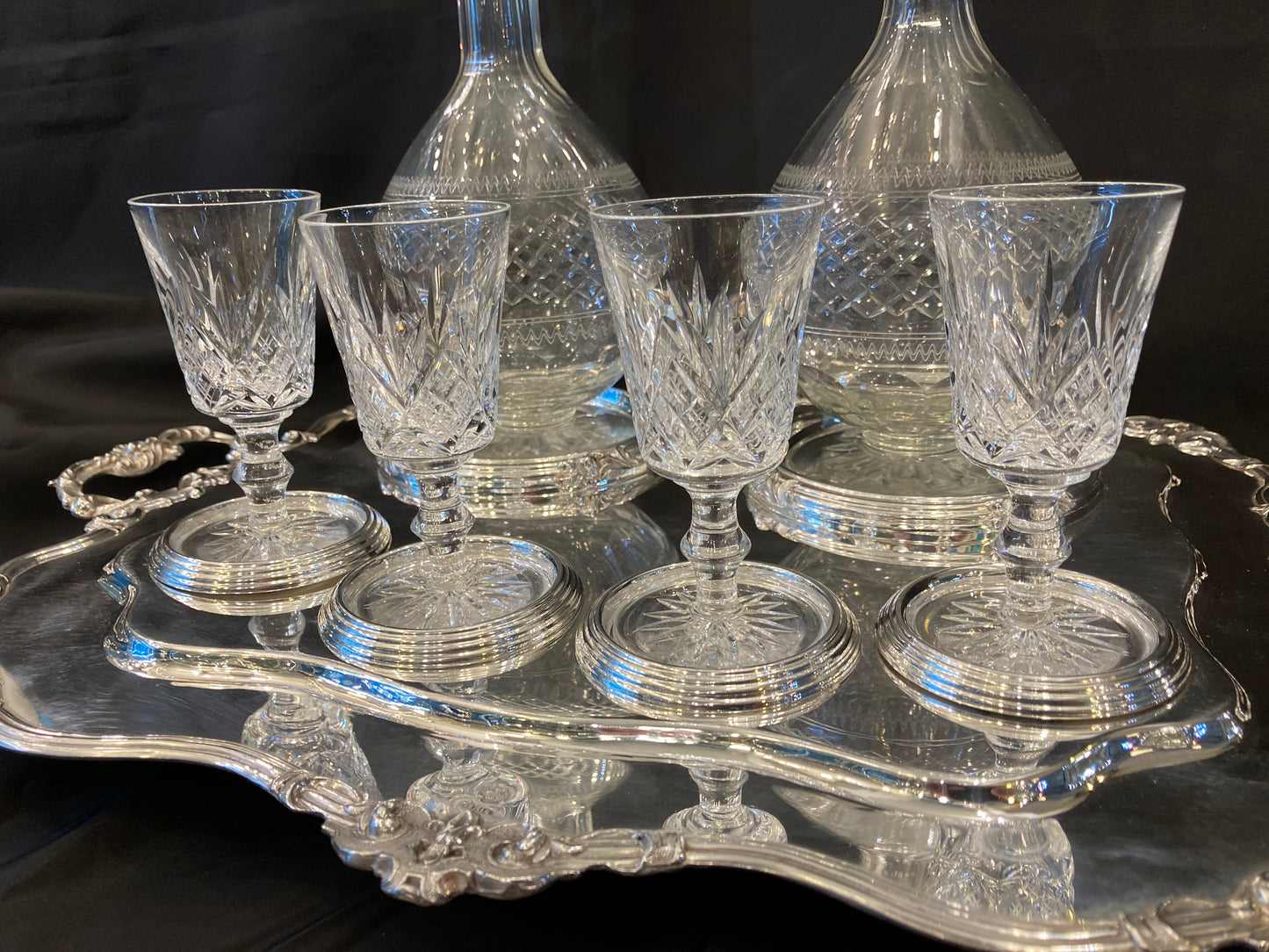 Antique silver plated drinks tray with cut crystal bottles and glasses