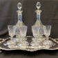 Antique silver plated drinks tray with cut crystal bottles and glasses