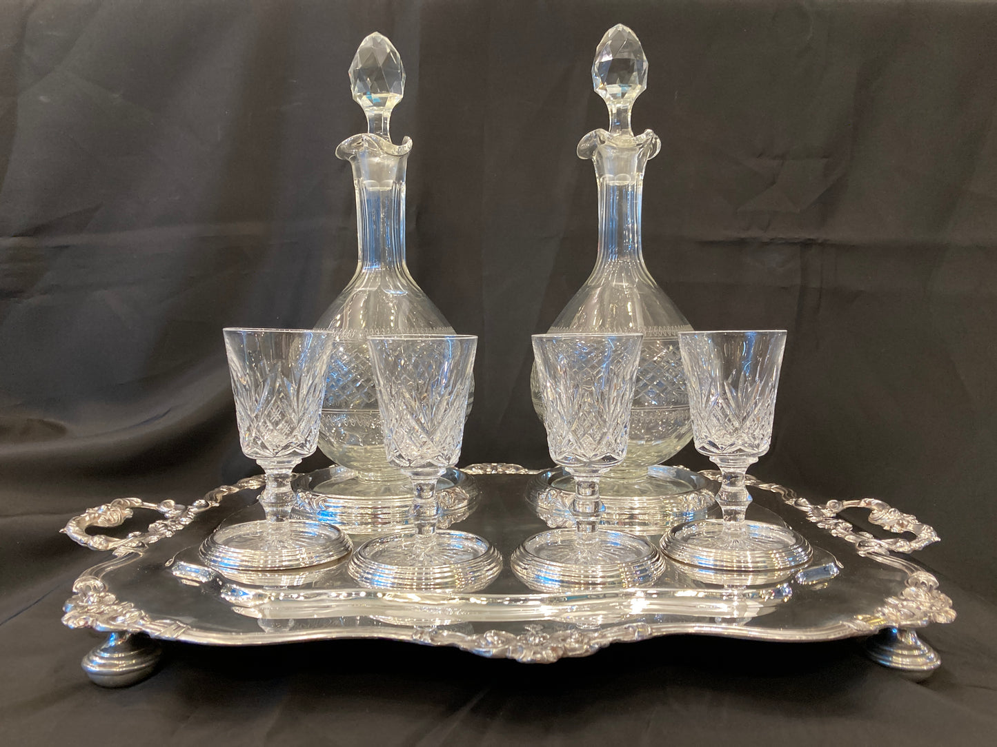 Antique silver plated drinks tray with cut crystal bottles and glasses