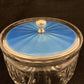 Large powder jar with blue guilloche enamel on silver lid by Adie Bros