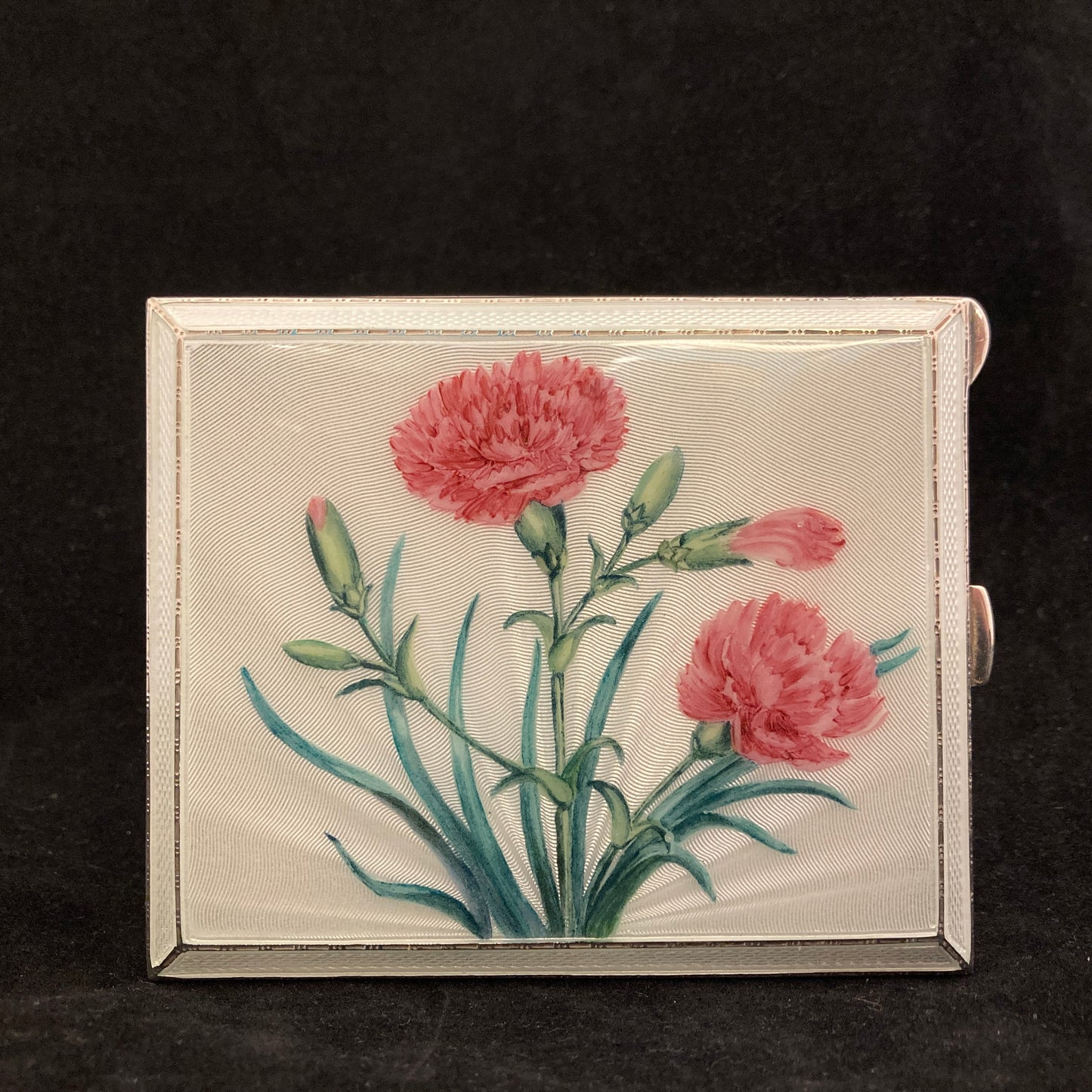 Sterling silver and hand painted guilloche enamel cigarette case.