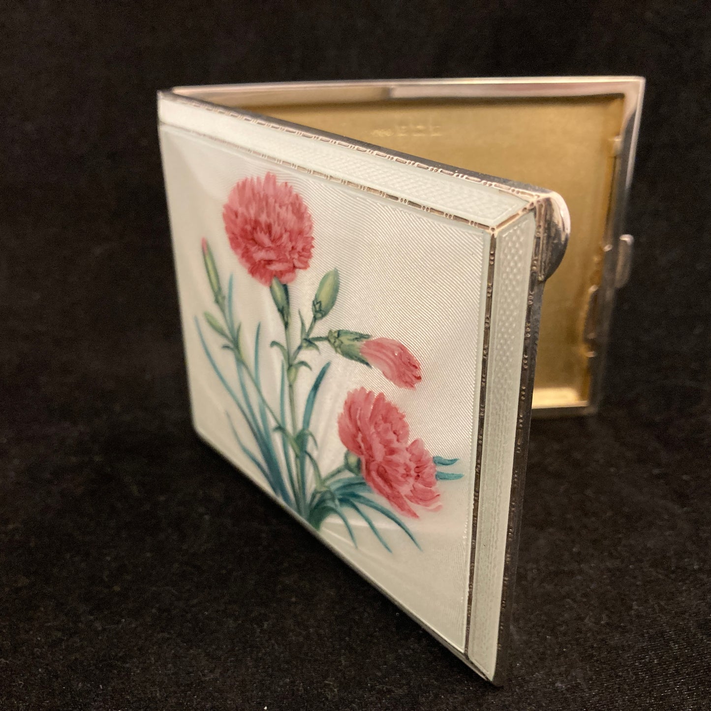 Sterling silver and hand painted guilloche enamel cigarette case.