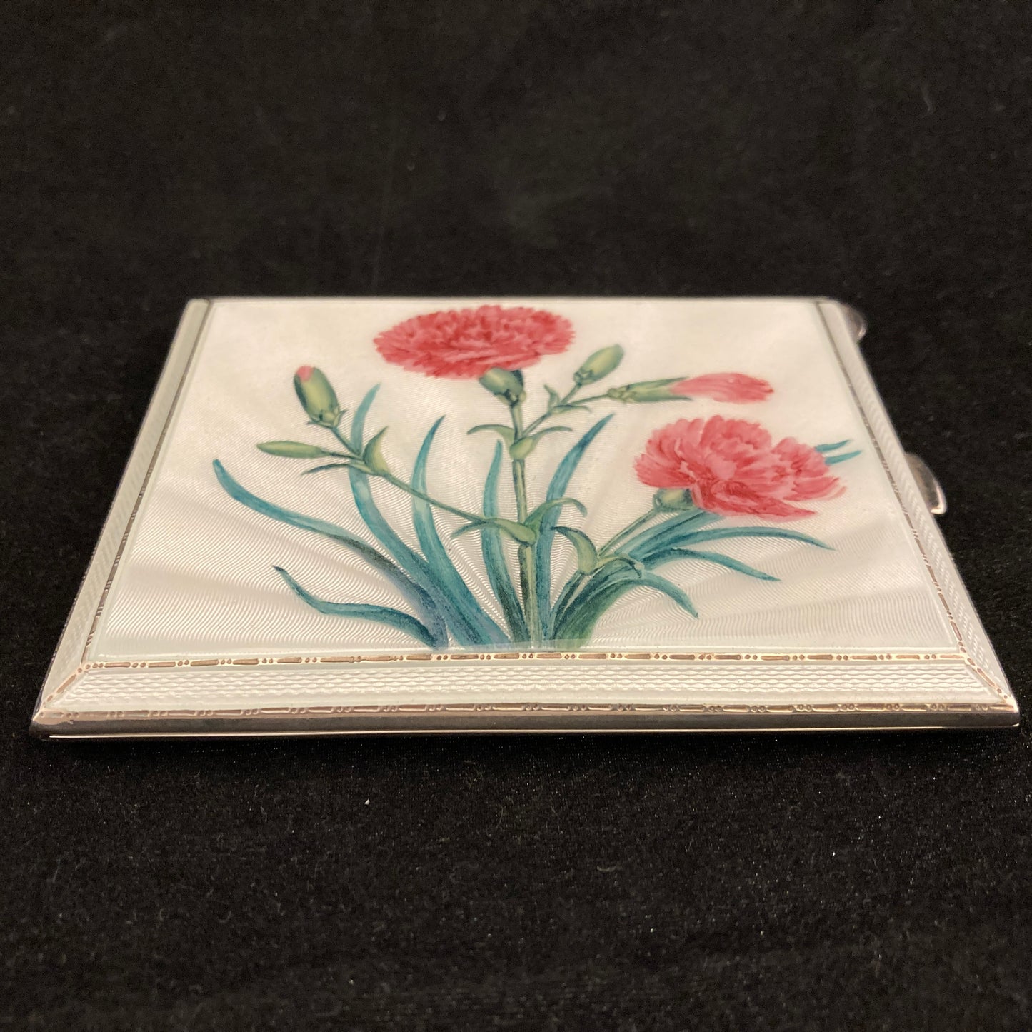 Sterling silver and hand painted guilloche enamel cigarette case.