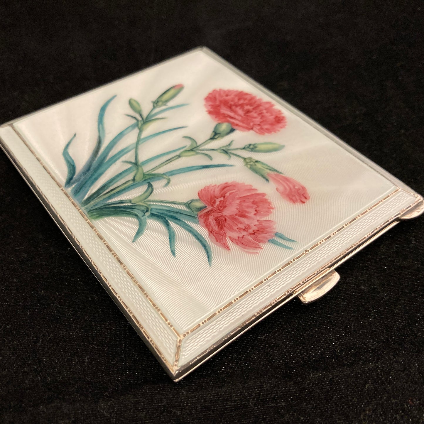 Sterling silver and hand painted guilloche enamel cigarette case.