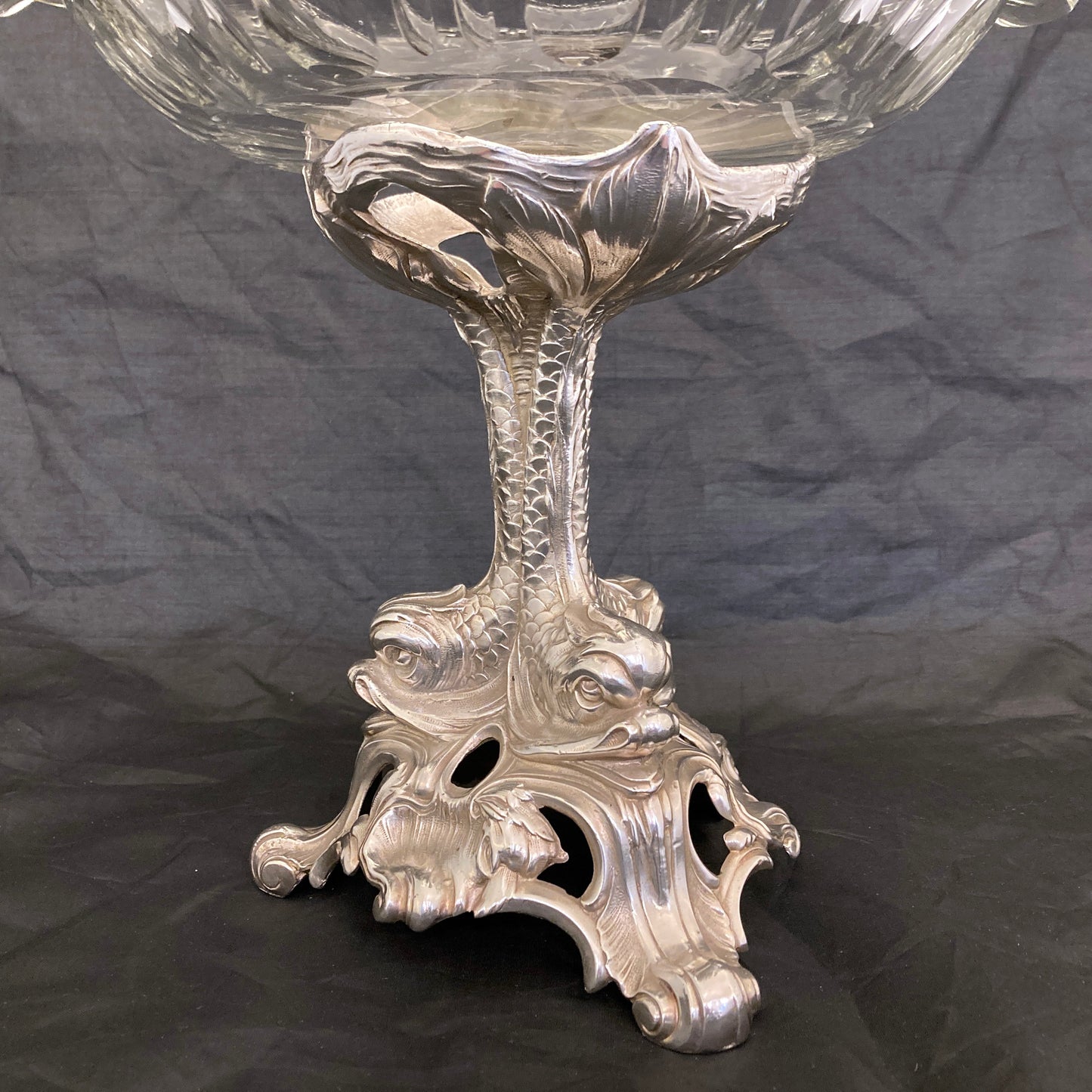 Silver plated centre piece with dolphins and a cut crystal bowl