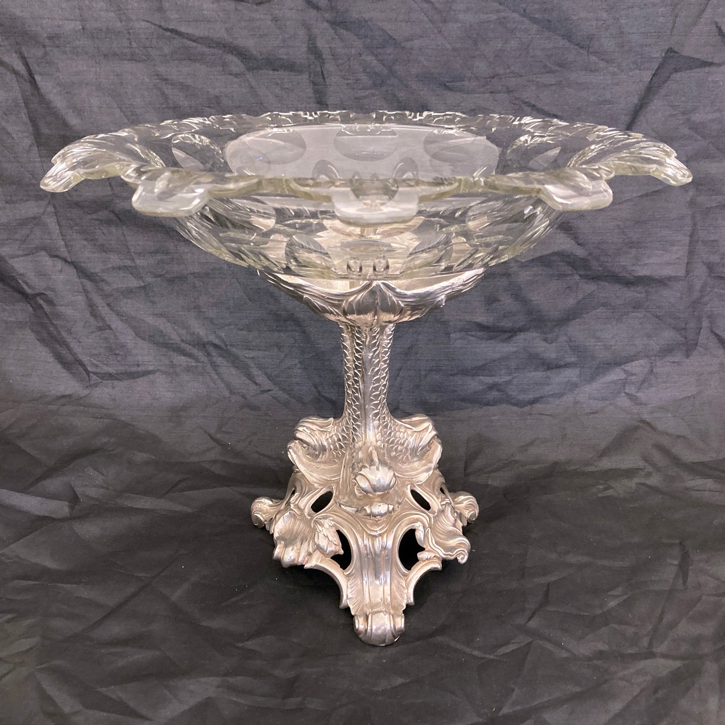 Silver plated centre piece with dolphins and a cut crystal bowl