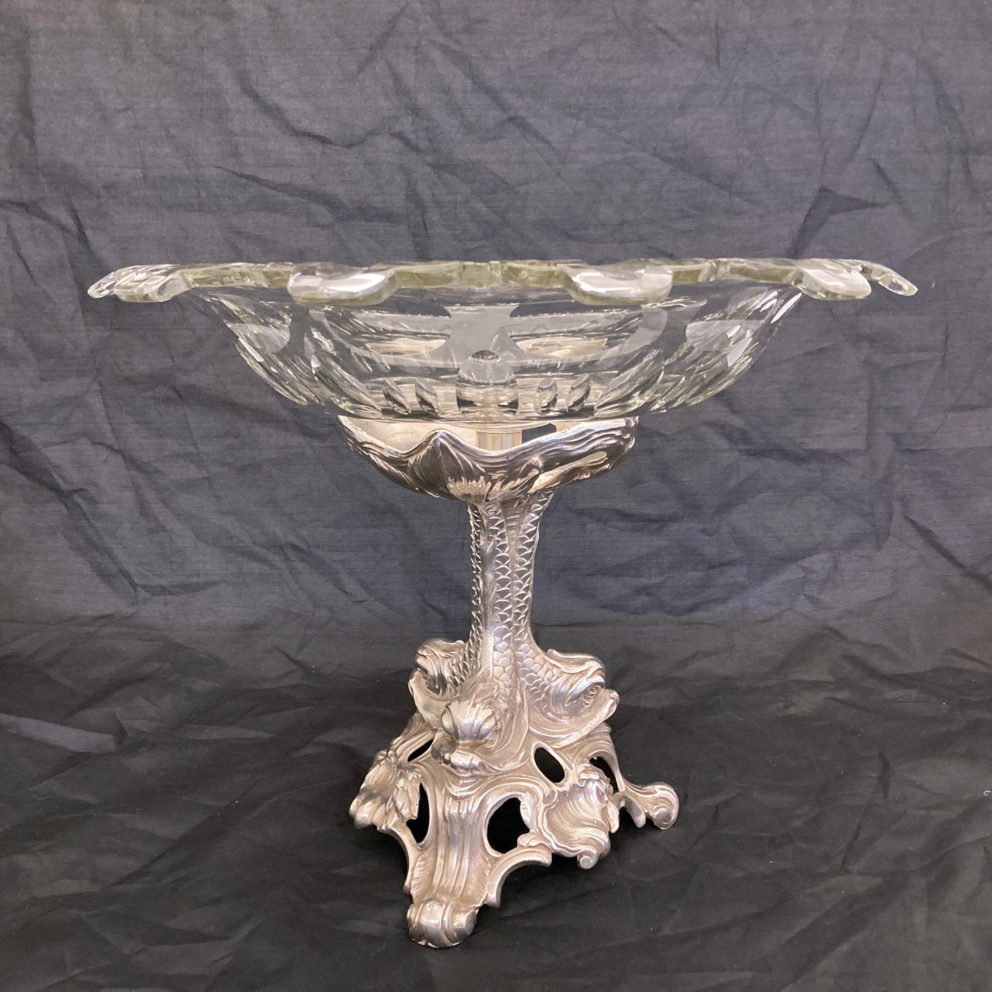 Silver plated centre piece with dolphins and a cut crystal bowl