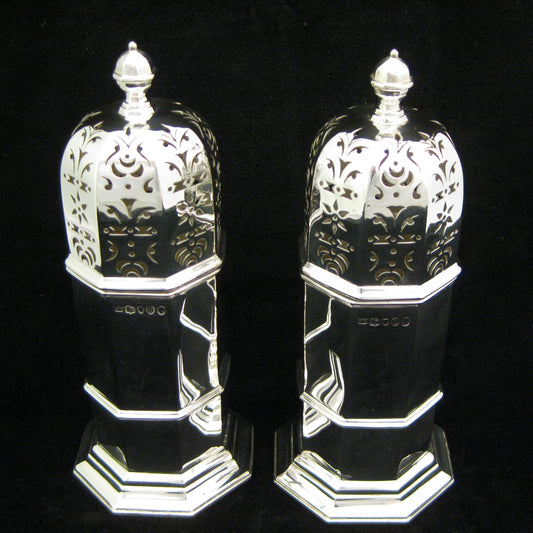 A pair of sugar shakers by Samuel Walton Smith.