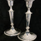 A pair of sterling silver candle sticks By Hanksworth & Eyre