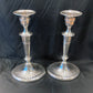 A pair of sterling silver candle sticks By Hanksworth & Eyre