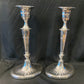 A pair of sterling silver candle sticks By Hanksworth & Eyre