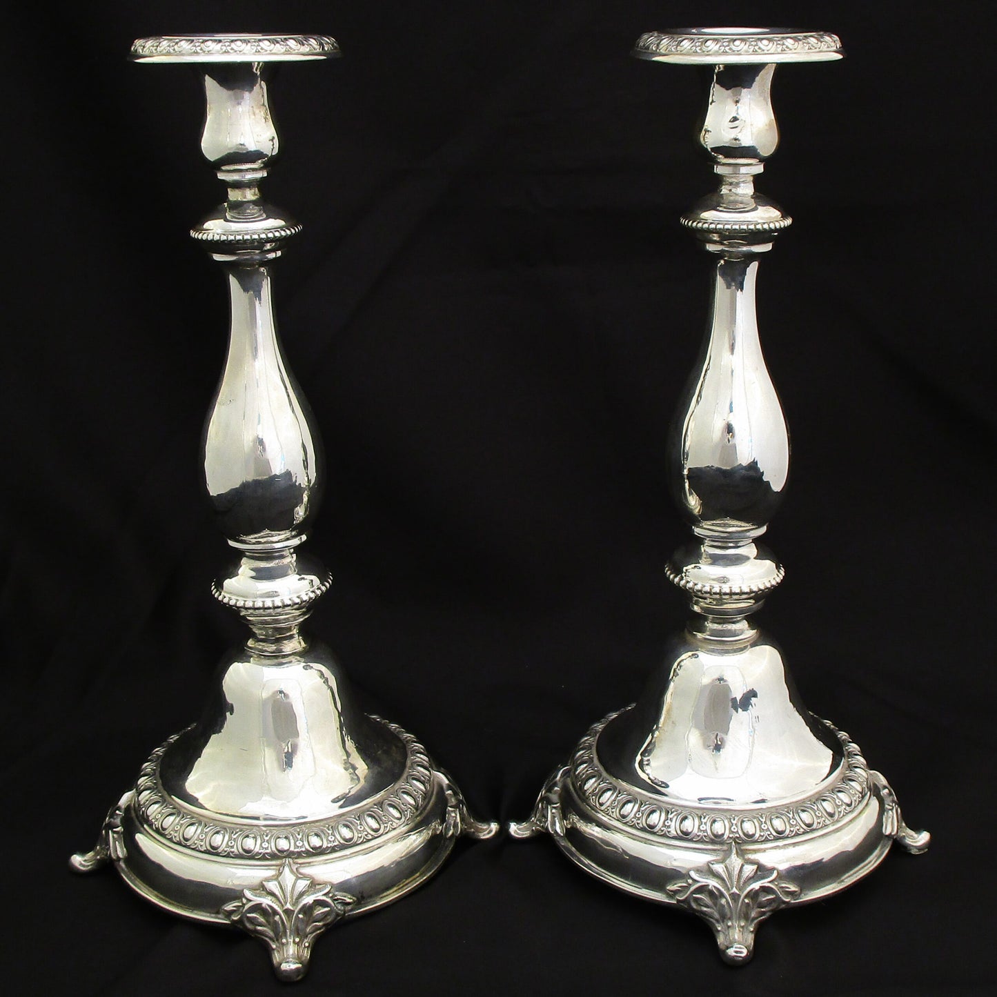 A pair of silver candlesticks – German