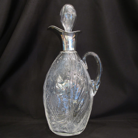Silver rimmed claret jug by James Deaking & sons