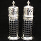 A rare pair of silver sugar shakers with blue liners.