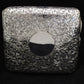 Chased silver cigarette case.