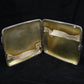 Chased silver cigarette case.