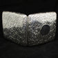 Chased silver cigarette case.