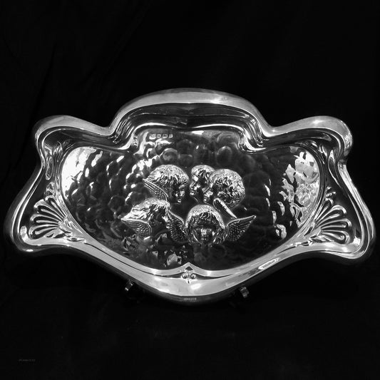 A sterling silver Reynolds Angels letter tray.