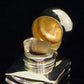 A rare unusually shaped silver perfume bottle
