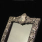 Sterling silver ornate table mirror/picture frame.