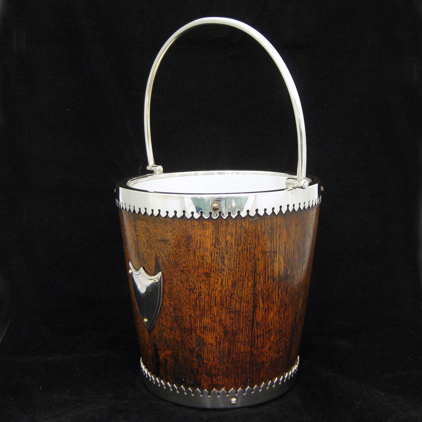 A mahogany ice bucket -cooler