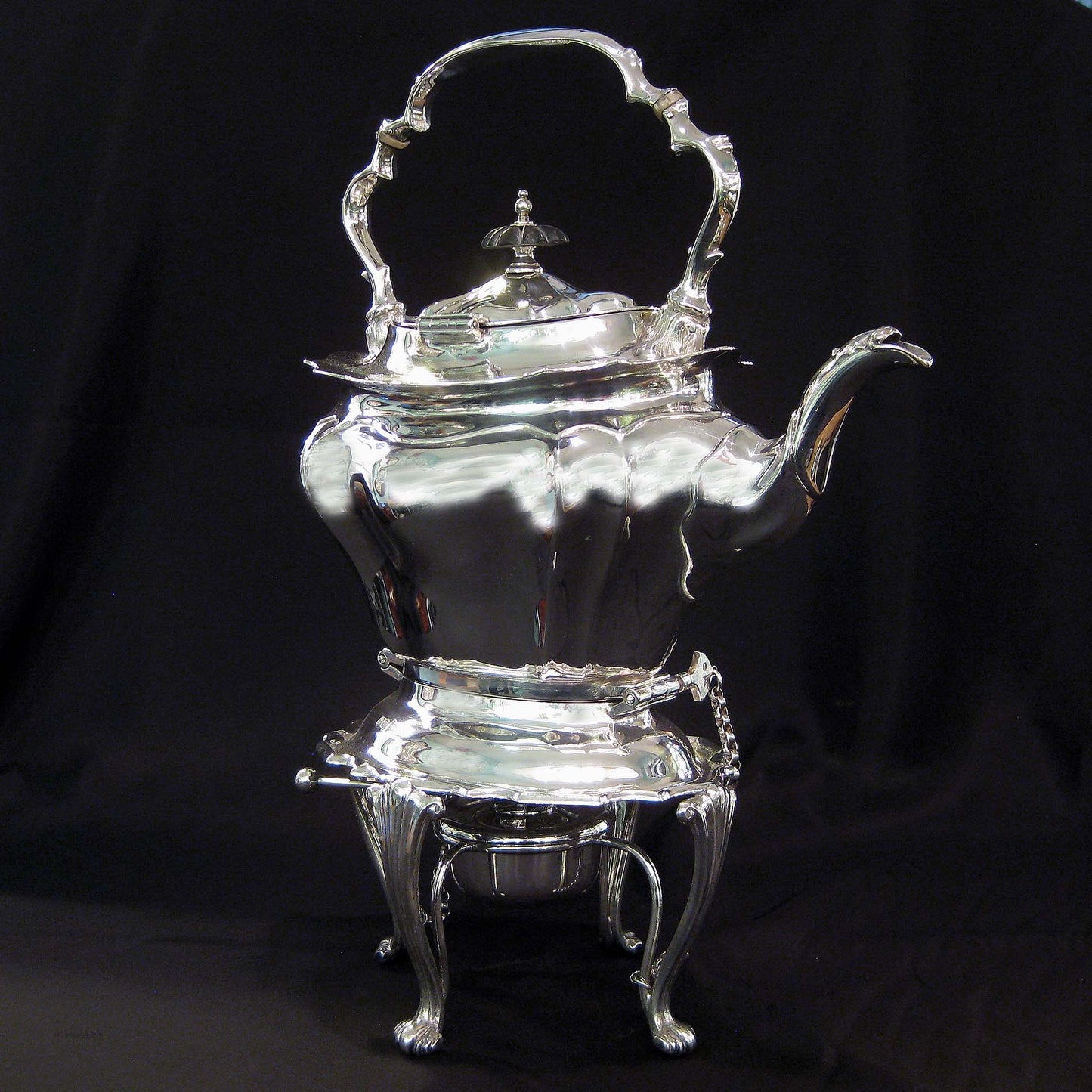 Silver kettle on stand by Walker & Hall