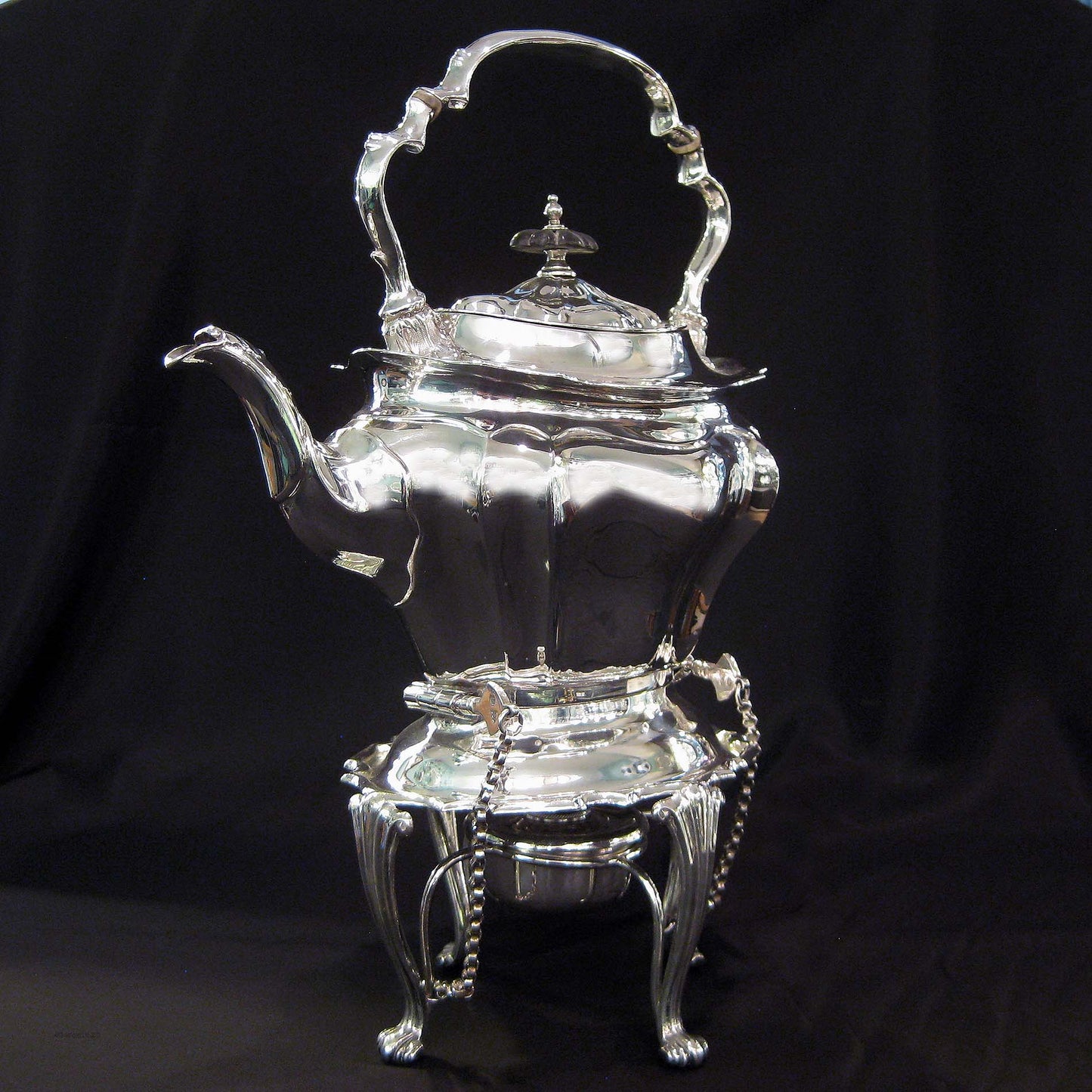 Silver kettle on stand by Walker & Hall