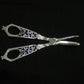 Silver grape scissors by William Hutton & sons