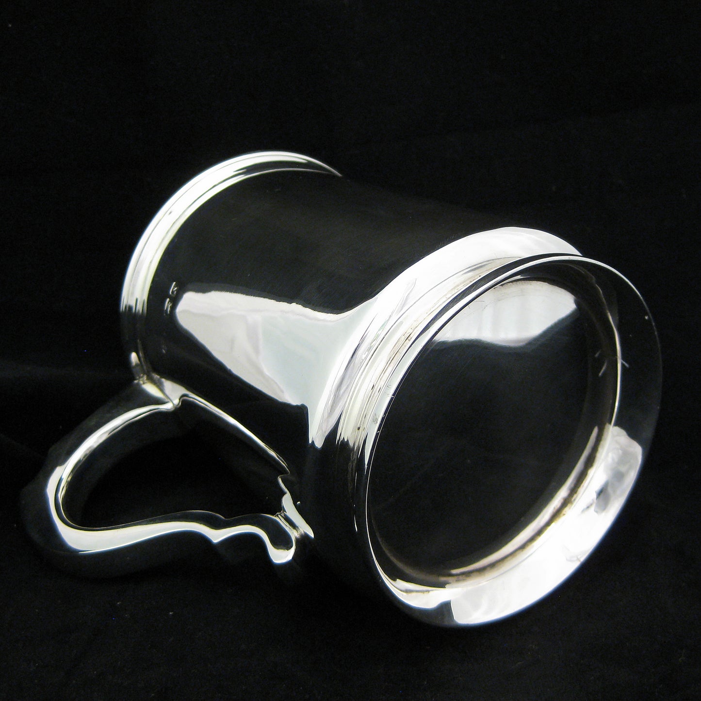 Large sterling silver tankard.Large sterling silver tankard.