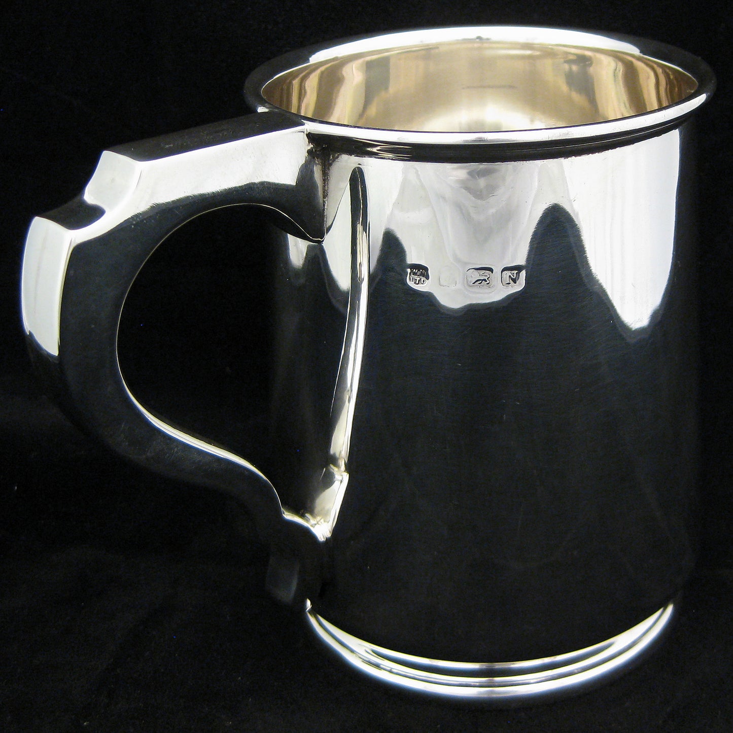 Large sterling silver tankard.Large sterling silver tankard.