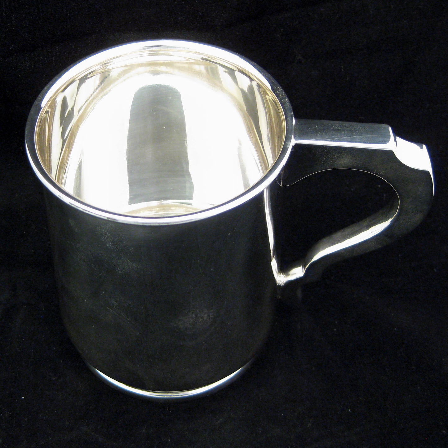 Large sterling silver tankard.Large sterling silver tankard.