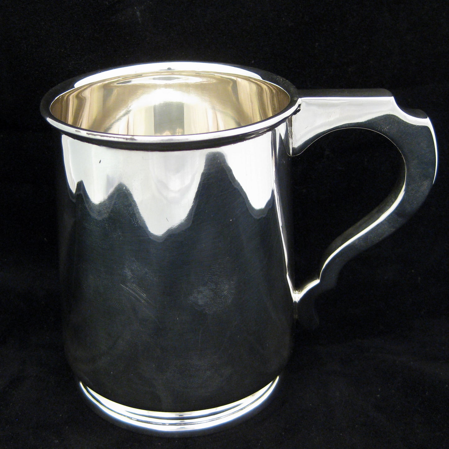 Large sterling silver tankard.Large sterling silver tankard.