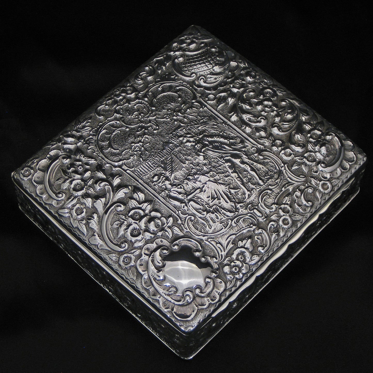 Wonderful quality chased silver jewellery box.