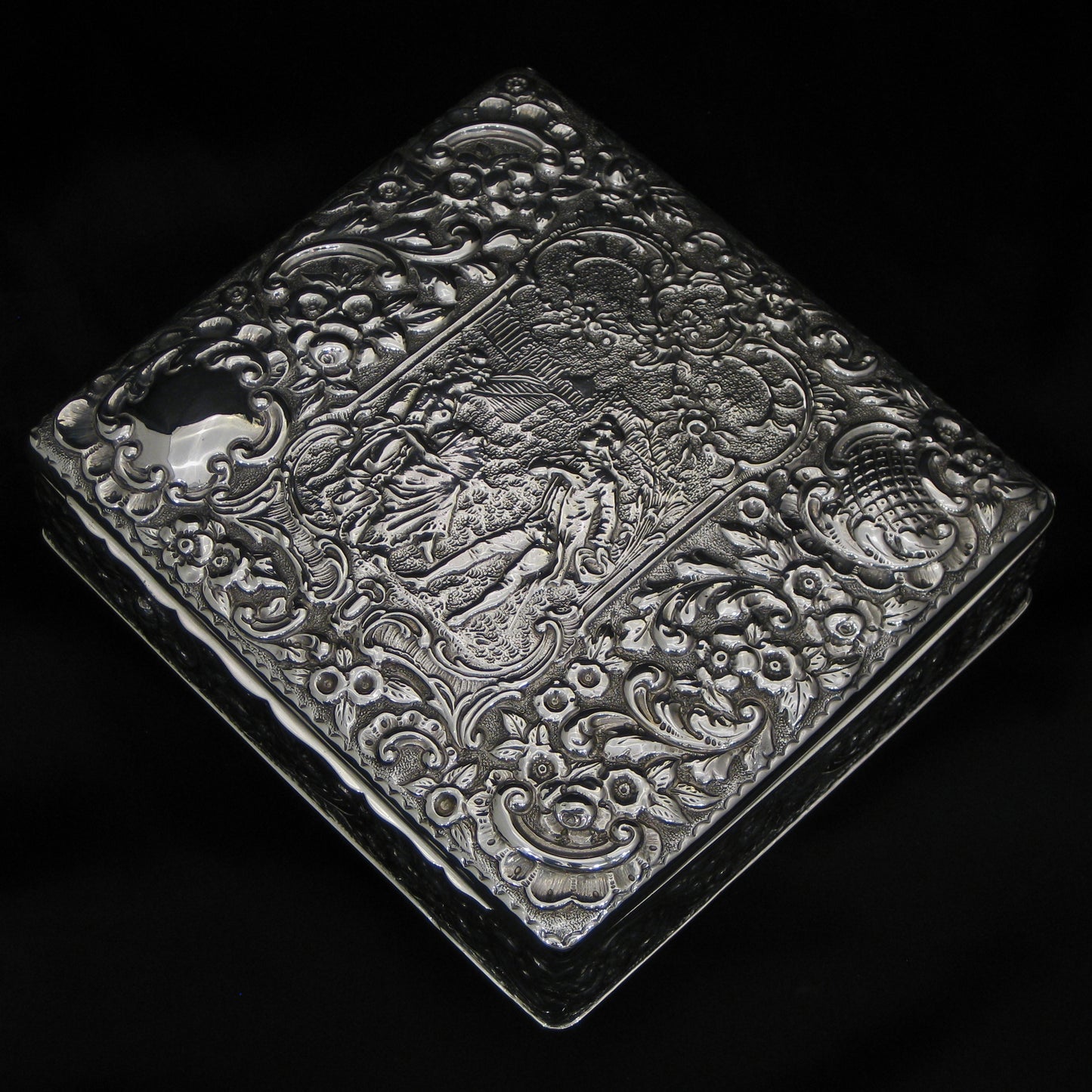 Wonderful quality chased silver jewellery box.