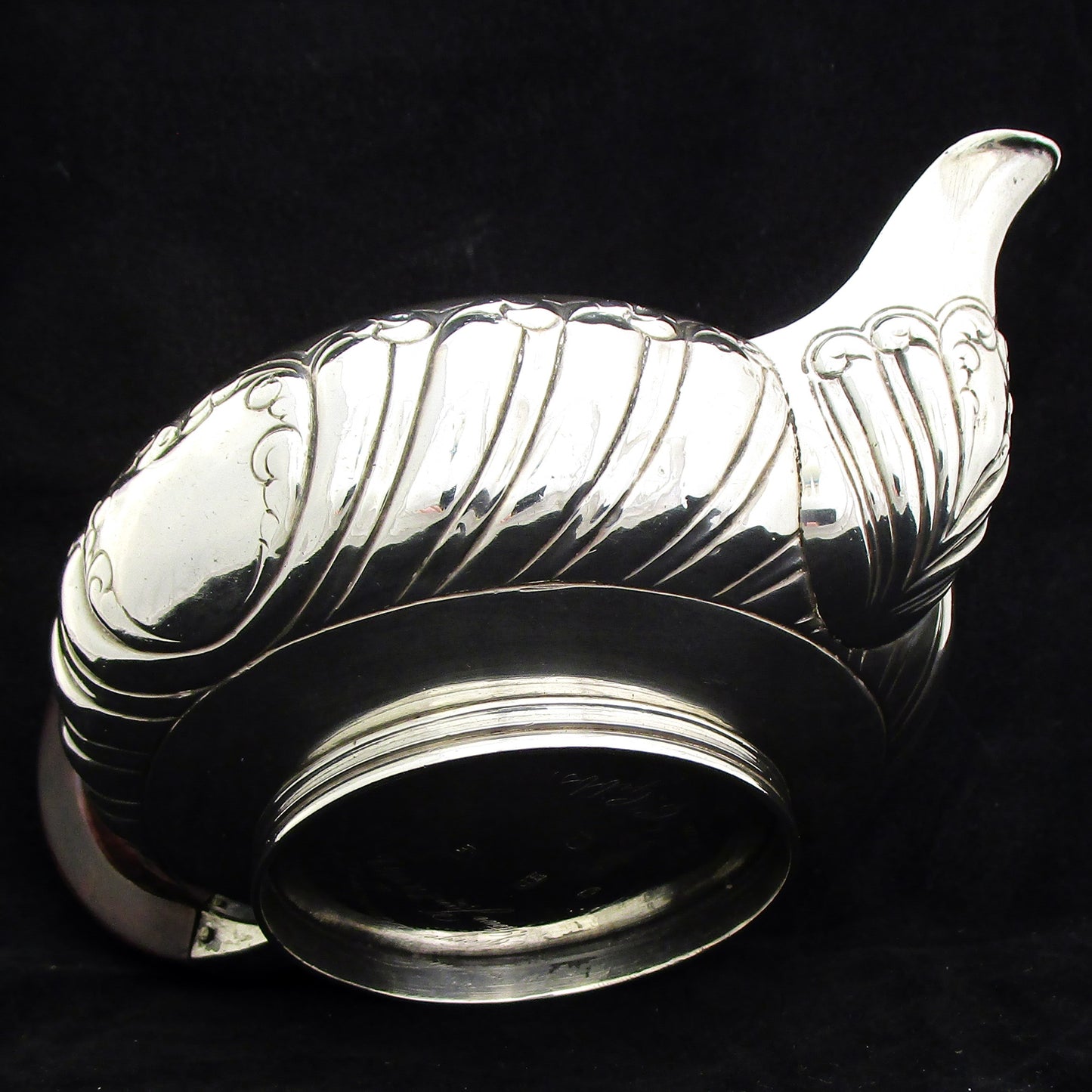 A Georgian sterling silver Bachelors tea pot.