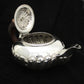 A Georgian sterling silver Bachelors tea pot.